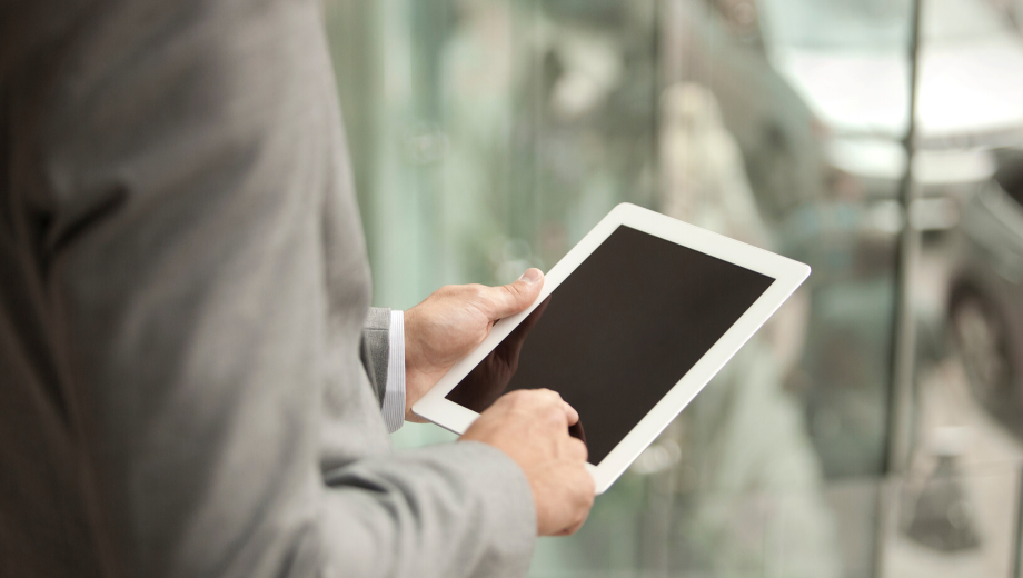 Business man with a tablet in his hands