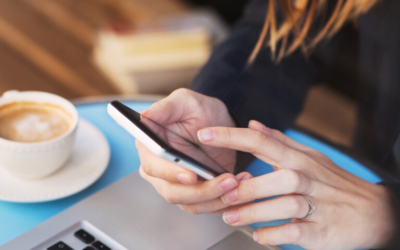 Woman with a mobile phone in her hand