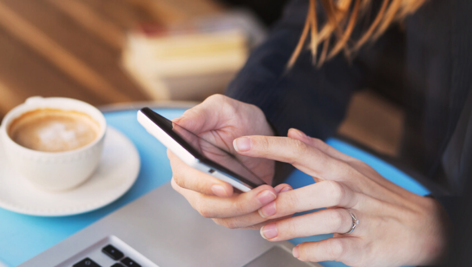 Woman with a mobile phone in her hand