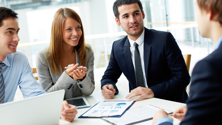 Business people discussing at the table