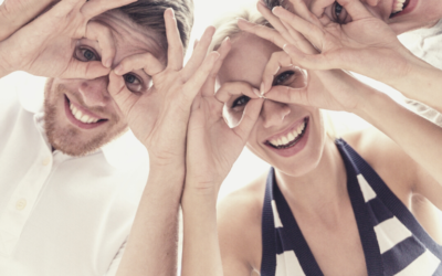 People looking happily into the camera