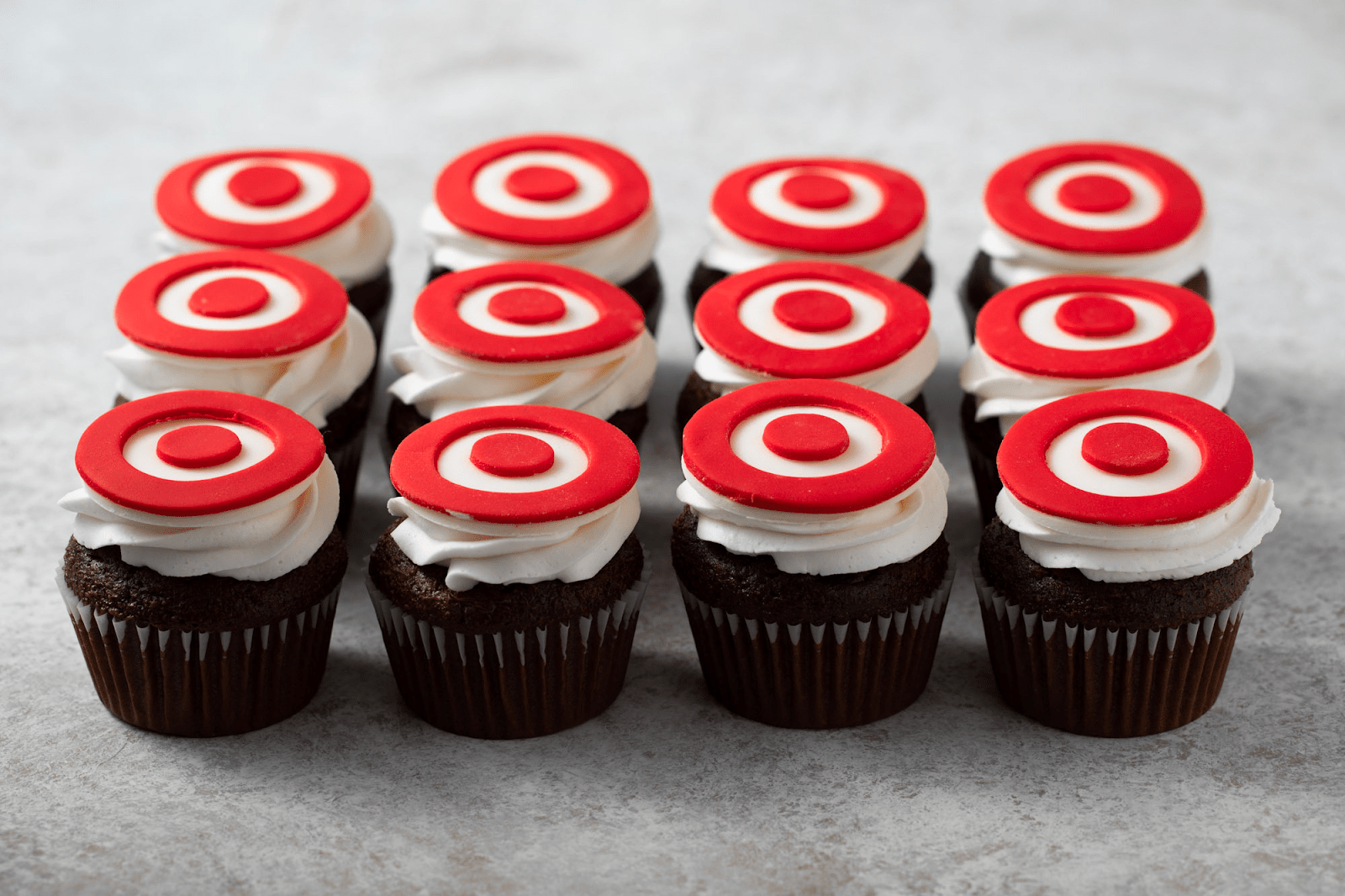 cupcakes with a sponsors logo on it